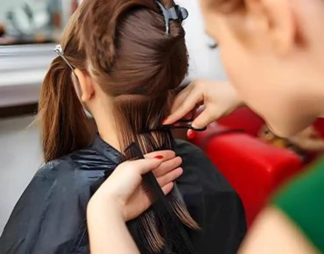 Woman Styling another woman's hair