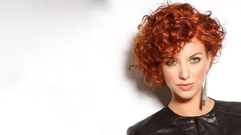 Girl in Asymmetrical Curly Bob